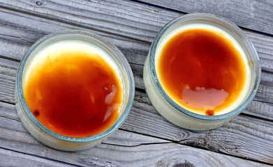 Bowls with creme brulee on table