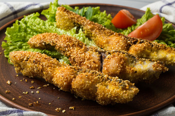 Tasty baked fish on plate table close-up