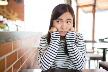 Woman so sad in cafe