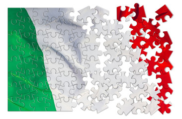 Green, white and red italian flag - concept image in jigsaw puzzle