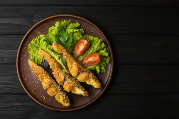 Tasty baked fish on plate