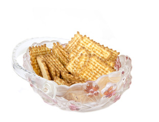 Delicious crispy biscuits in a glass basket