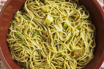 Spaghetti al pesto served in the traditional way