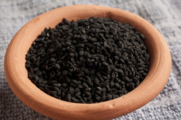 a small bowl of nigella seeds
