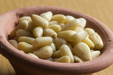 a small bowl of pine nuts