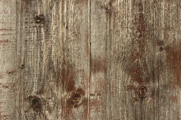 Naklejka premium Texture. Background. Two aging brown wooden planks with knots