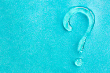The question mark drawn in a transparent ointment or gel. Blue a