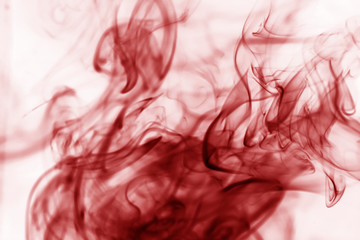 Toxic fumes movement on a white background..Red smoke movement o