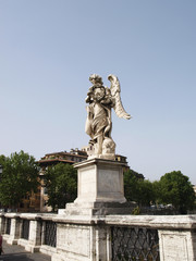 Fototapeta na wymiar Angel with crown of thorns at Ponte Sant'Angelo Rome, Italy