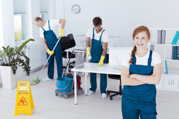 Cleaners working in office