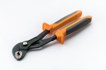 Tools, yellow pliers, close-up / Yellow pliers on white background