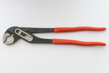 Locking pliers, close up / Red pliers on white background
