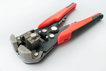Wire strippers, close-up / Wire strippers on white background, close-up