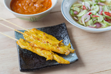 Grilled chicken satay with peanut sauce and vinegar of vegetable