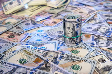 background from scattered dollar banknotes as abstract seamless.