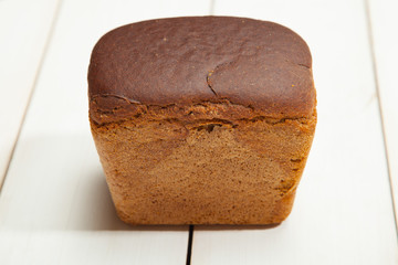 Bread on a white wooden background