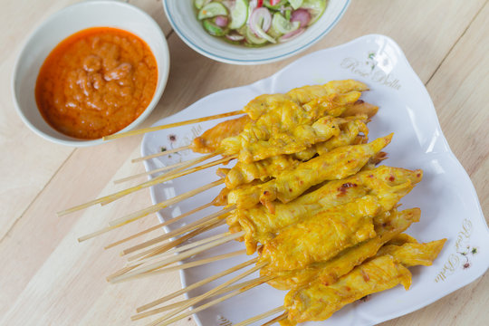 Grilled chicken satay with peanut sauce and vinegar of vegetable