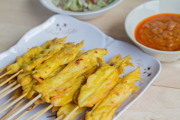 Grilled chicken satay with peanut sauce and vinegar of vegetable