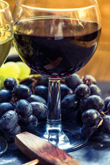 red wine in glass with grapes