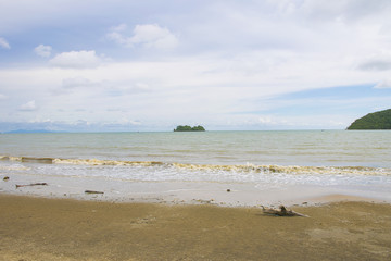 sea with blue sky background in Thailand. Landscape of river/lake and forest.