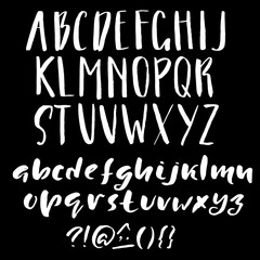 Hand drawn font made by dry brush strokes. Grunge style alphabet