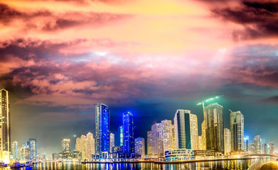 Obraz premium Dubai Marina skyscrapers reflections at sunset, UAE