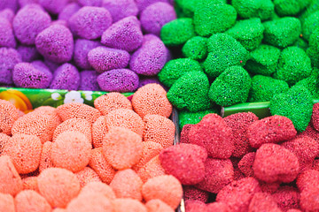 Multicolored marmalade on store shelves