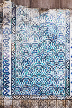 Seamless pattern white Turkish tiles with blue ornaments. Old