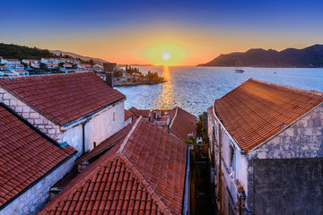 Korcula rooftops aerial sunset. / Aerial view on mediterranean town Korcula during sunset time, european famous places.