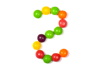 Multicolor sweets on white background