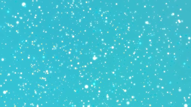 Sparkling particles flickering on a turquoise blue background.