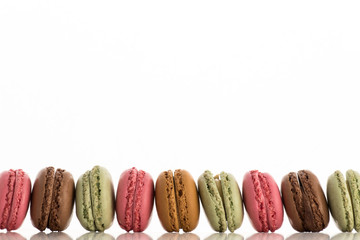 Colorful macaroons isolated on a white background with copyspace
