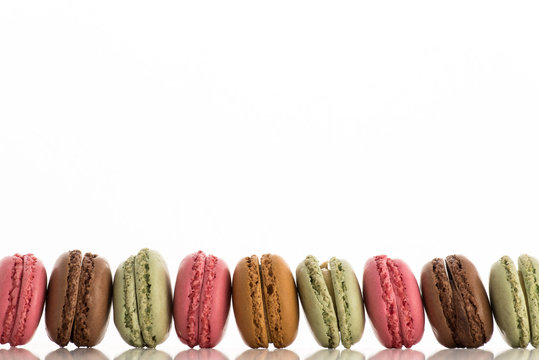 Colorful macaroons isolated on a white background with copyspace