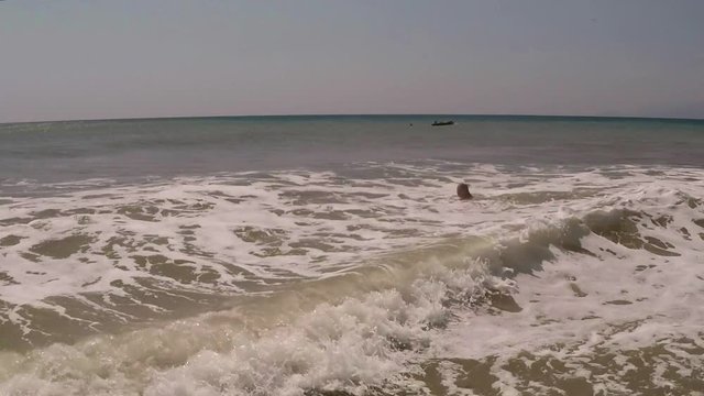Child, Little Girl Swimming in Sea Water, young Lady plays in surf, beach