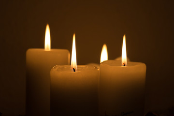 four burning candles
