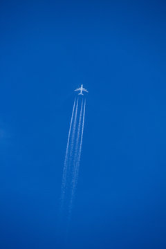 Airplane with contrails