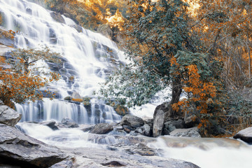 Waterfall in rainforest at northern of Thailand.