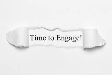 Fototapeta premium Time to Engage! on white torn paper
