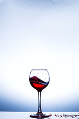 Wine splashing in glass