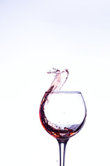Wine splashing in glass
