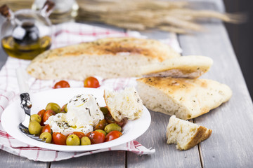 Italian focaccia with onion and basil