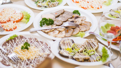 Lots appetizers on a table in a restaurant