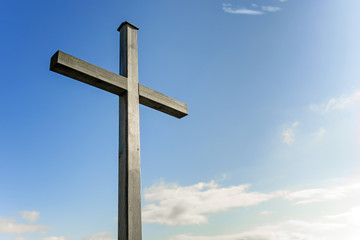 Wooden cross against blue sky