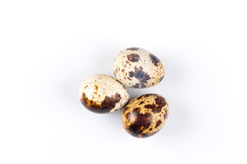 Quail eggs on white