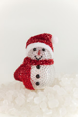 Snow Man on a pile of white crystalline