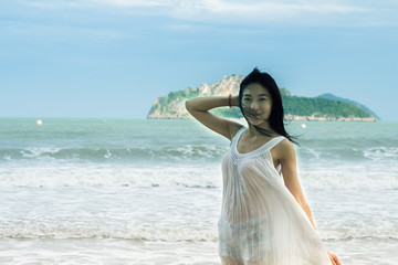 Fototapeta na wymiar Portrait of beautiful young asian woman summer vacation on beach