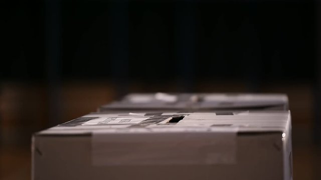 Unrecognizable people casting votes into the ballot box during elections