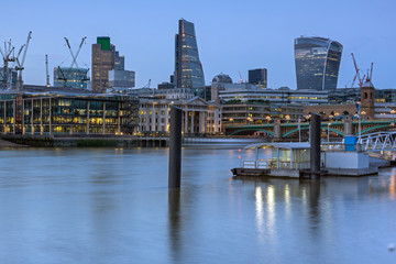 LONDON, ENGLAND - JUNE 17 2016: Night Photo of Thames River and skyscrapers,  London, Great Britain