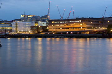 Fototapeta premium LONDON, ENGLAND - JUNE 17 2016: Night Photo of Thames River and skyscrapers, London, Great Britain