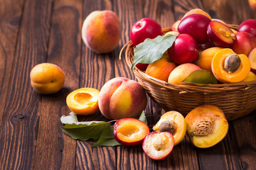 Naklejka na ściany i meble Fresh fruits in a basket